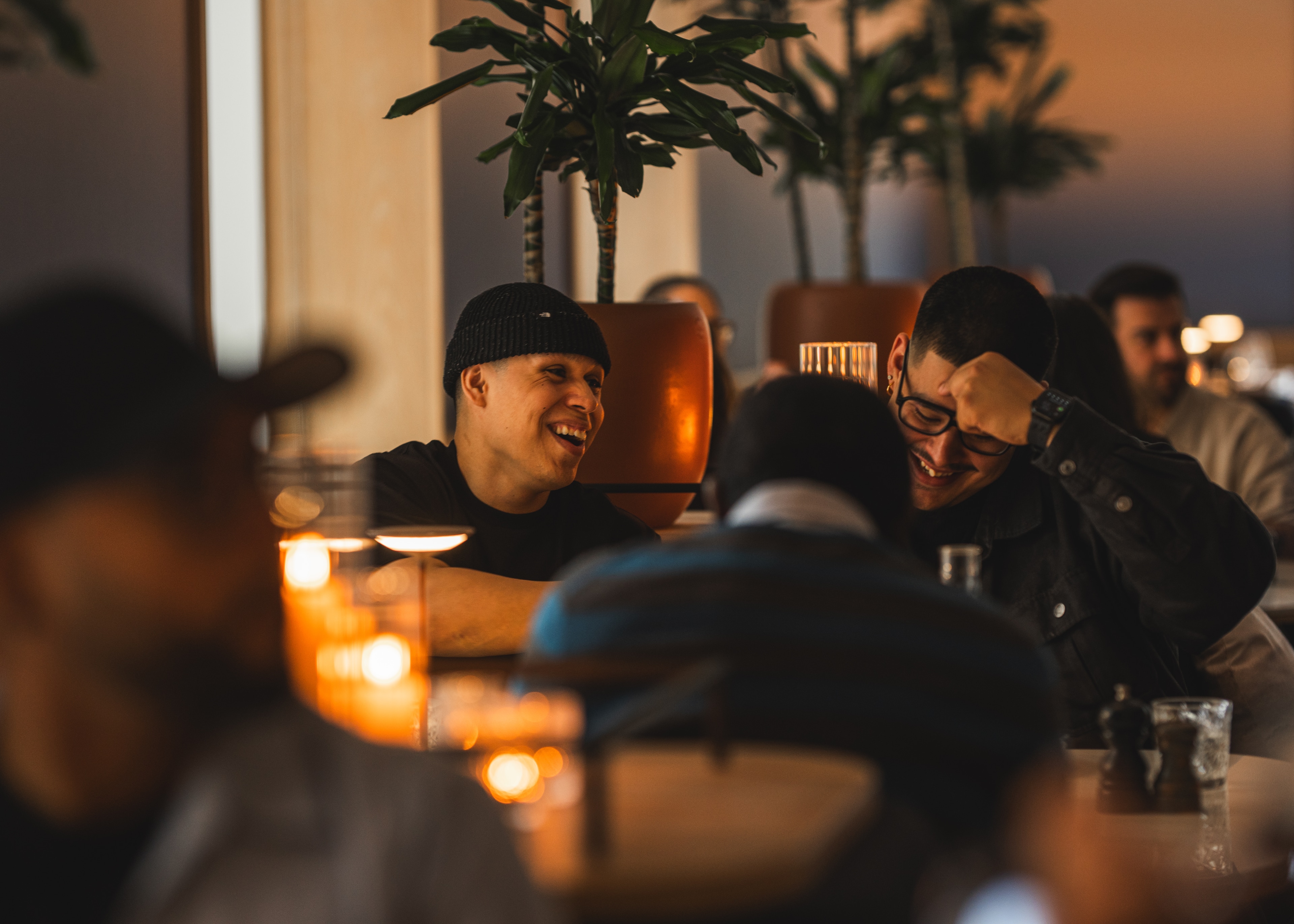 guest laughting and eating at Tbsp. Restaurant